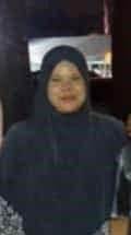 Nurul Hasanah Marun, a woman with fair skin and a round face. Wears a headscarf.