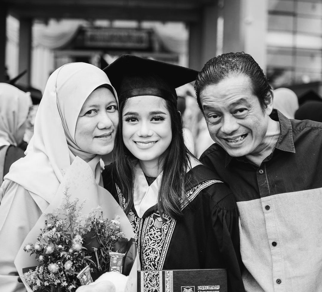 Nordin Ahmad at his daughter's graduation ceremony. 