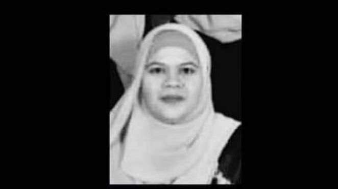 Aznariyah Binti Omar is wearing a headscarf. The photo is from a condolence message.